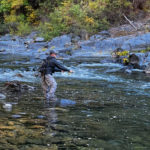 husband and wife fishing North Fork of the Yuba River in Fall